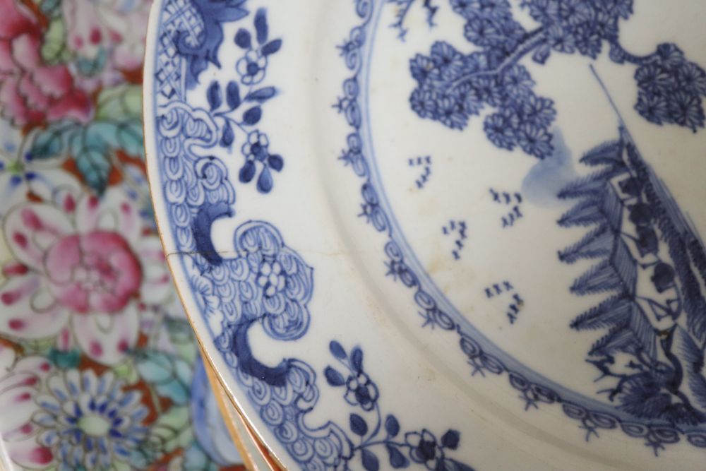 A collection of Oriental chargers and plates,